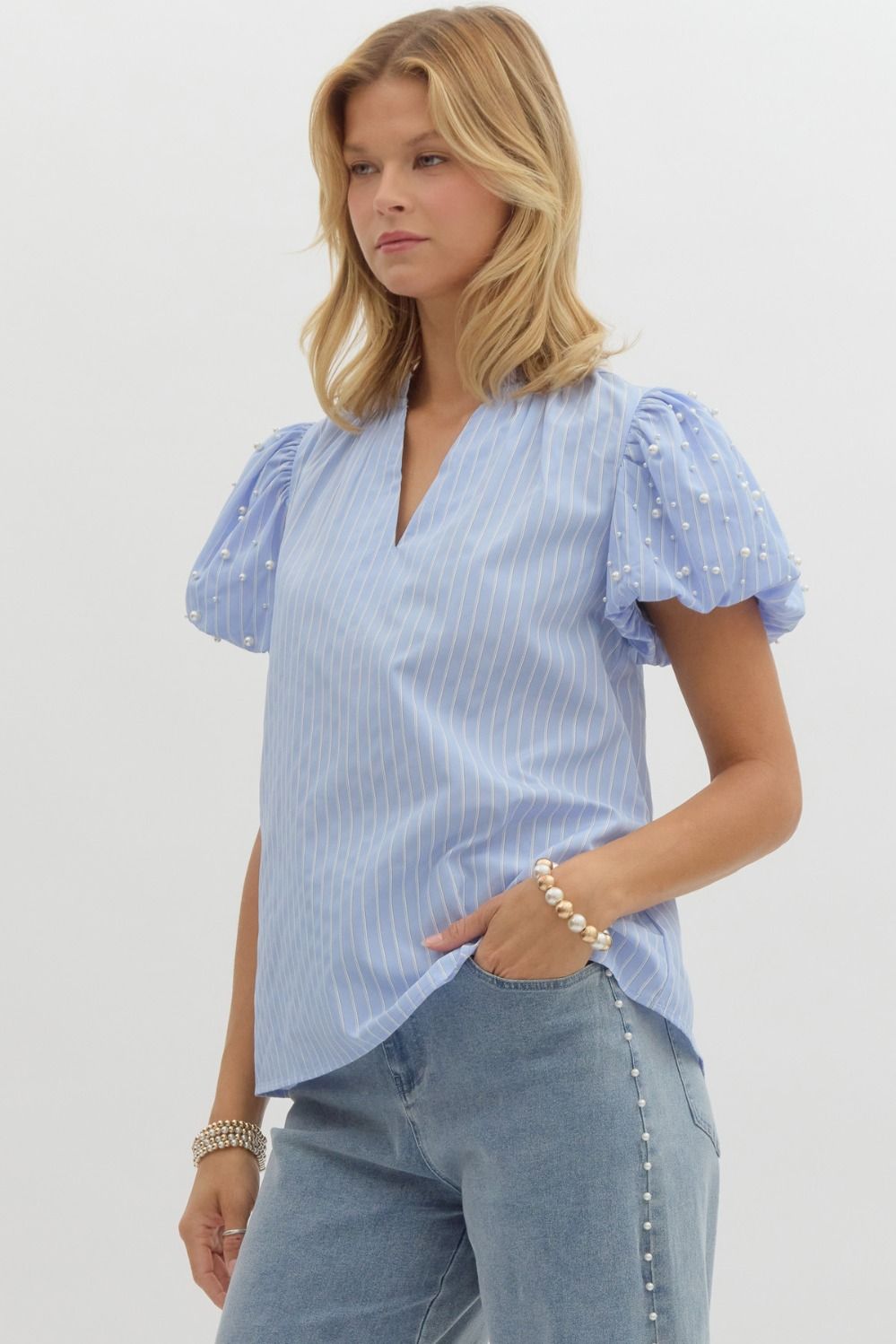 Pinstripe ruffled split V-neck pullover top